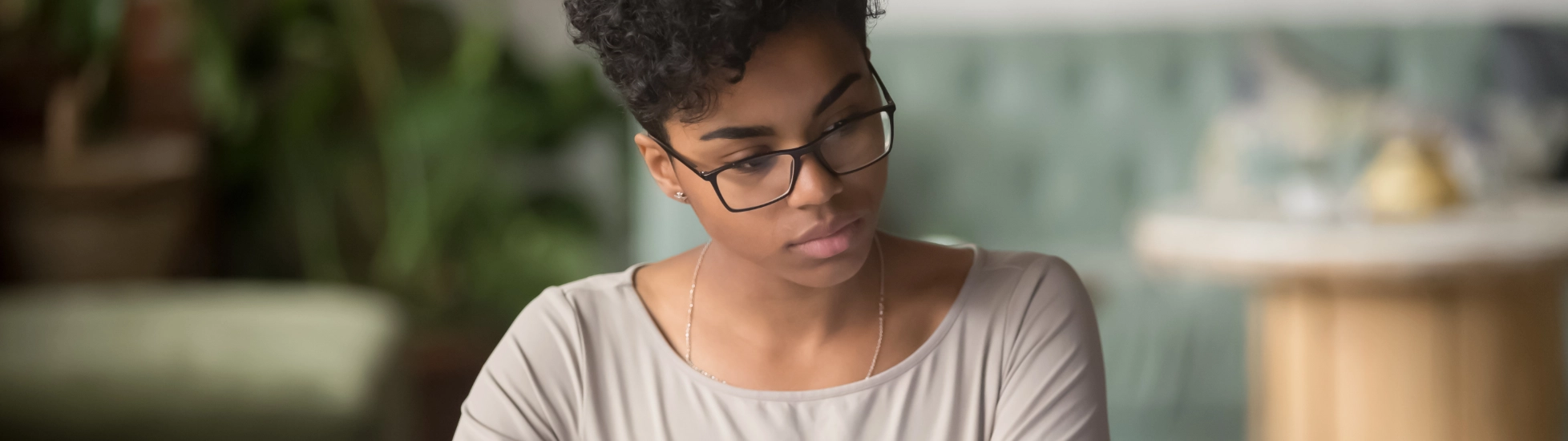 Woman studying data on a laptop
