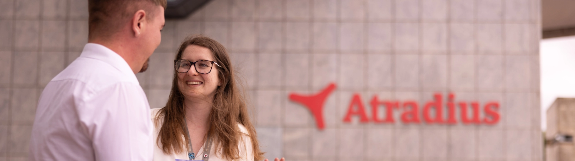 People talking in front of Atradius Cardiff office