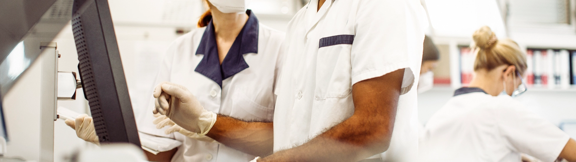Laboratory workers discussing results 